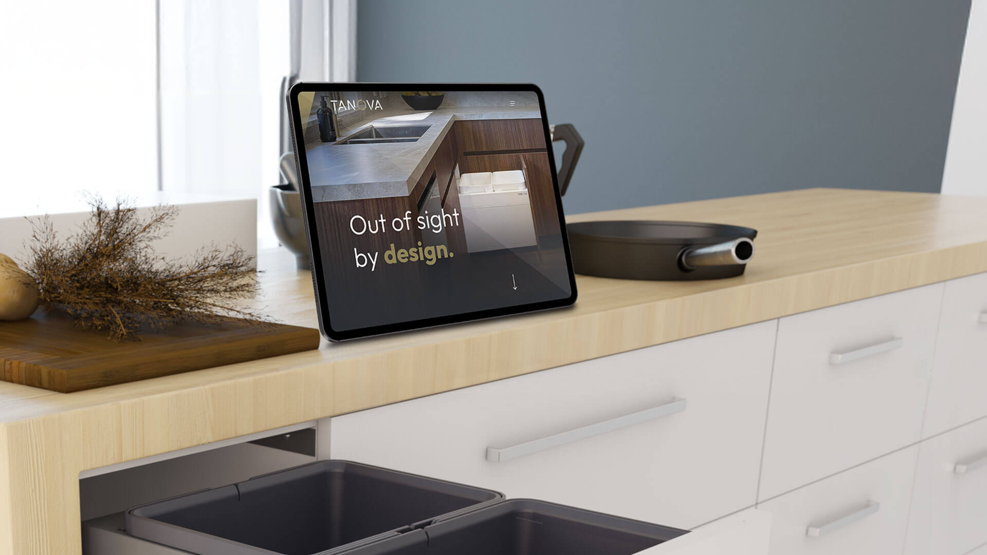 ipad on a stand in a kitchen showing Tanovas website